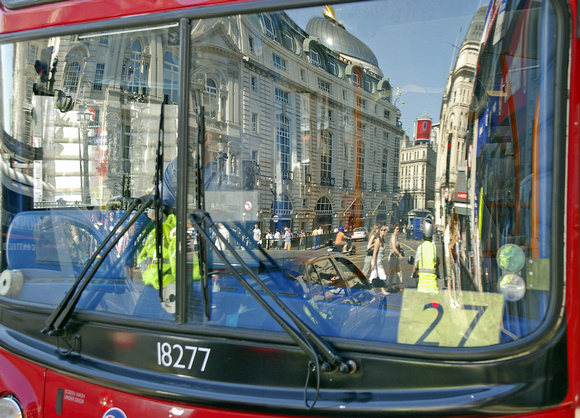 Piccadilly Circus, reflections on the windscreen of a London bus